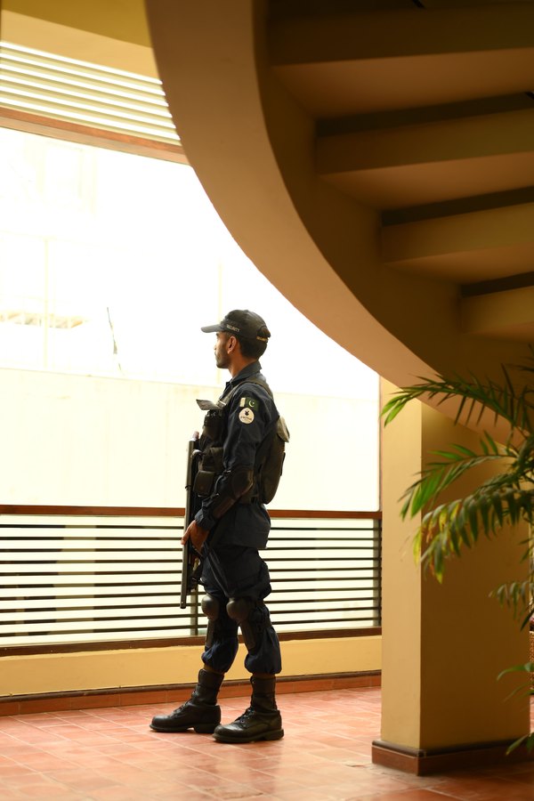Uniformed security guard on duty at a client site